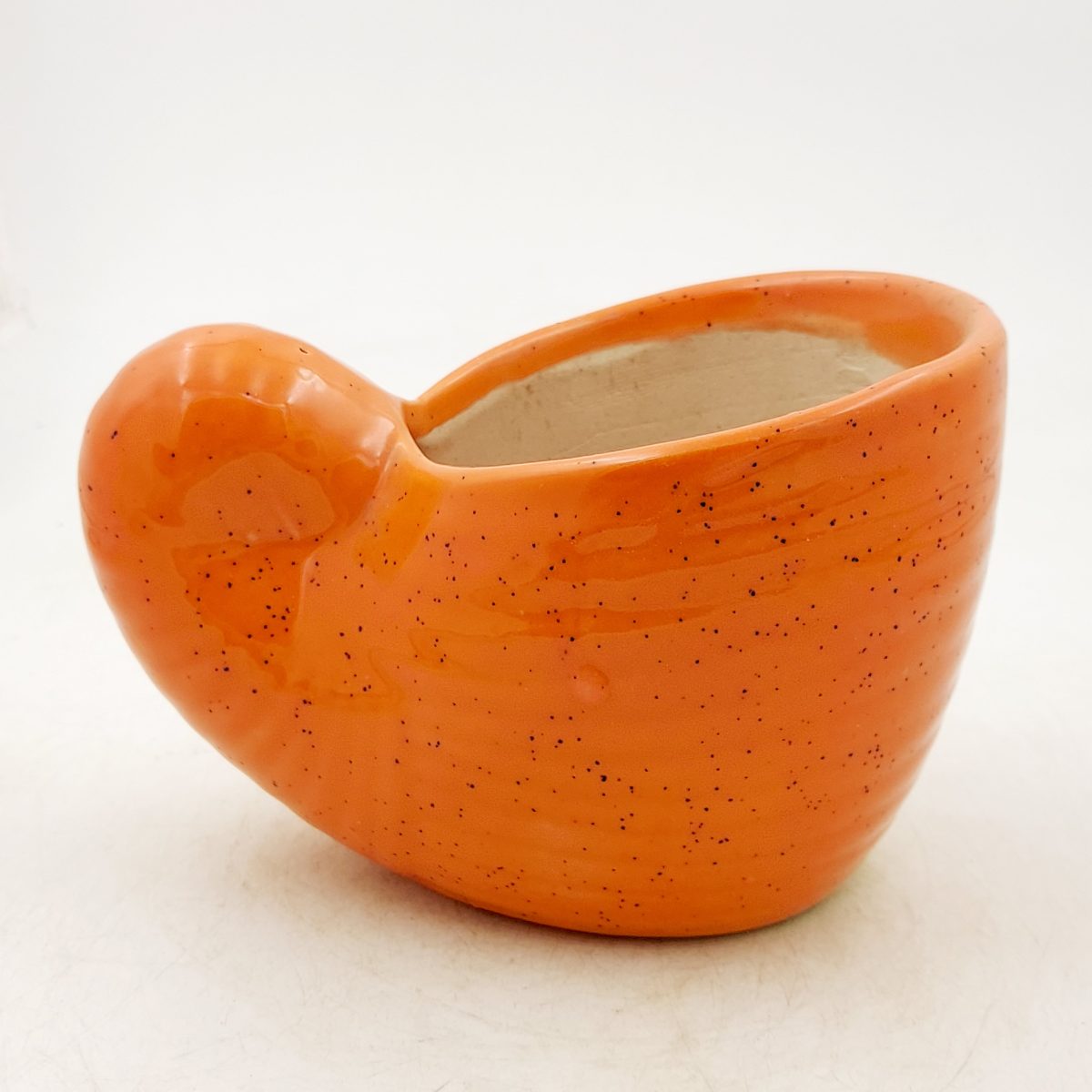 Orange snail pot